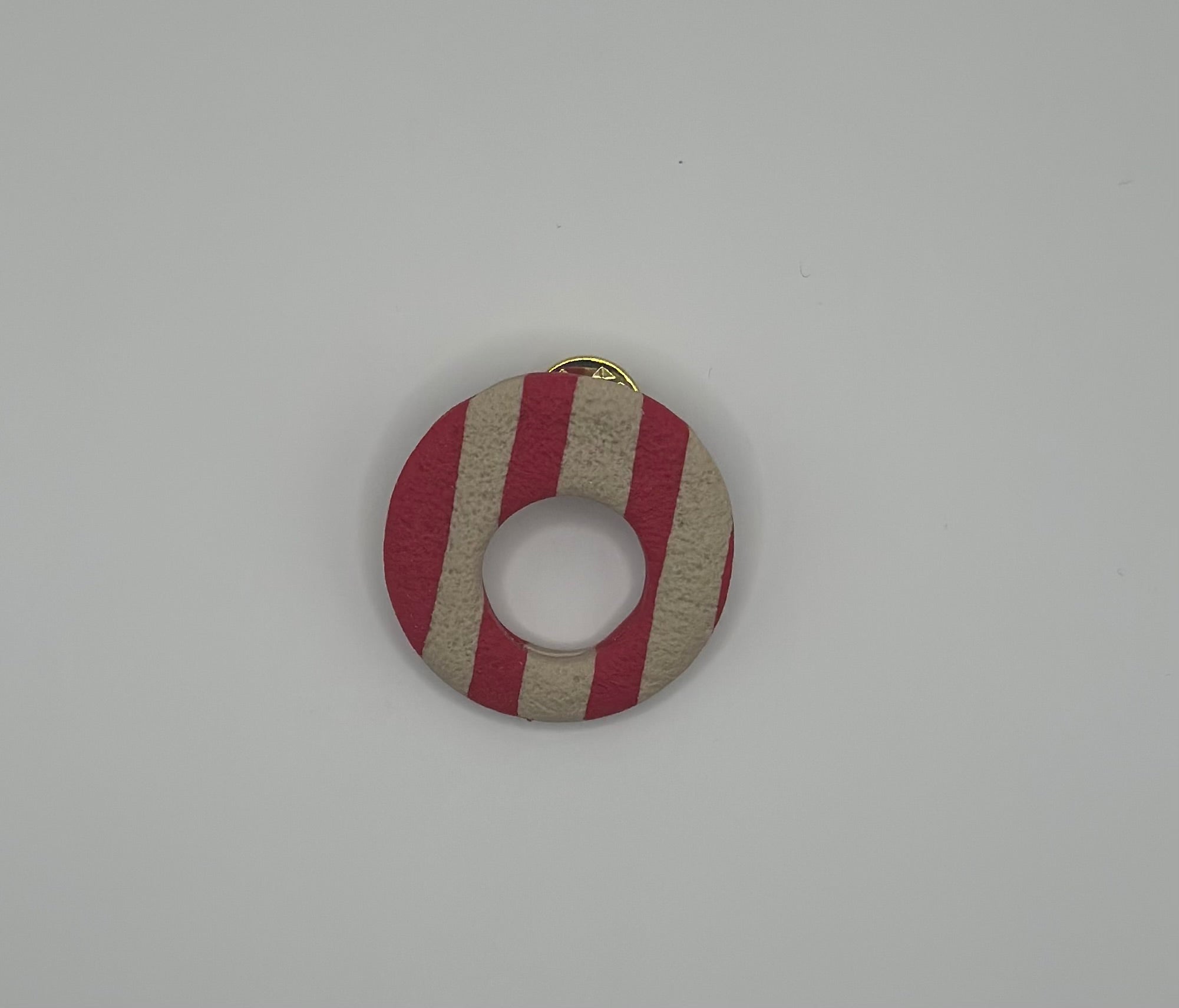 Pin’s de lunette rond à rayures
