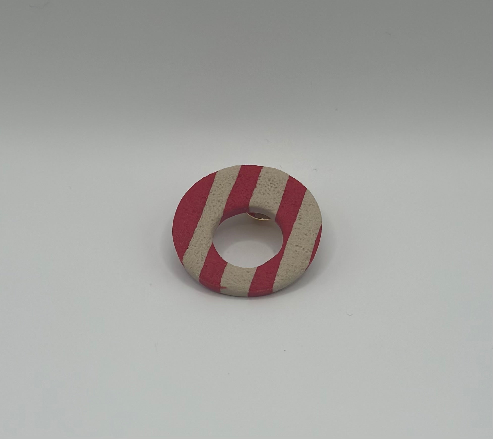 Pin’s de lunette rond à rayures