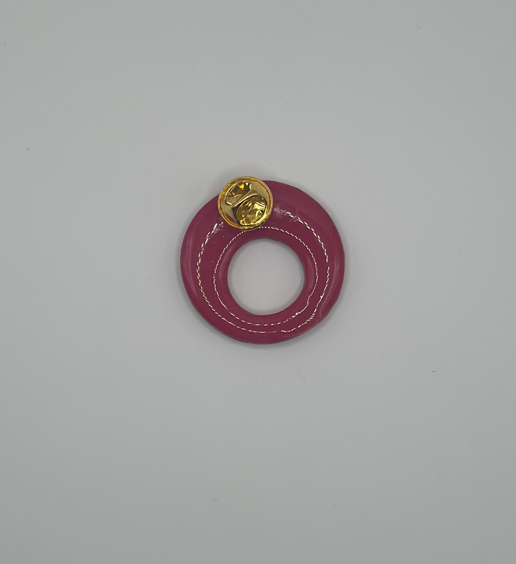 Pin’s de lunette rond fuchsia