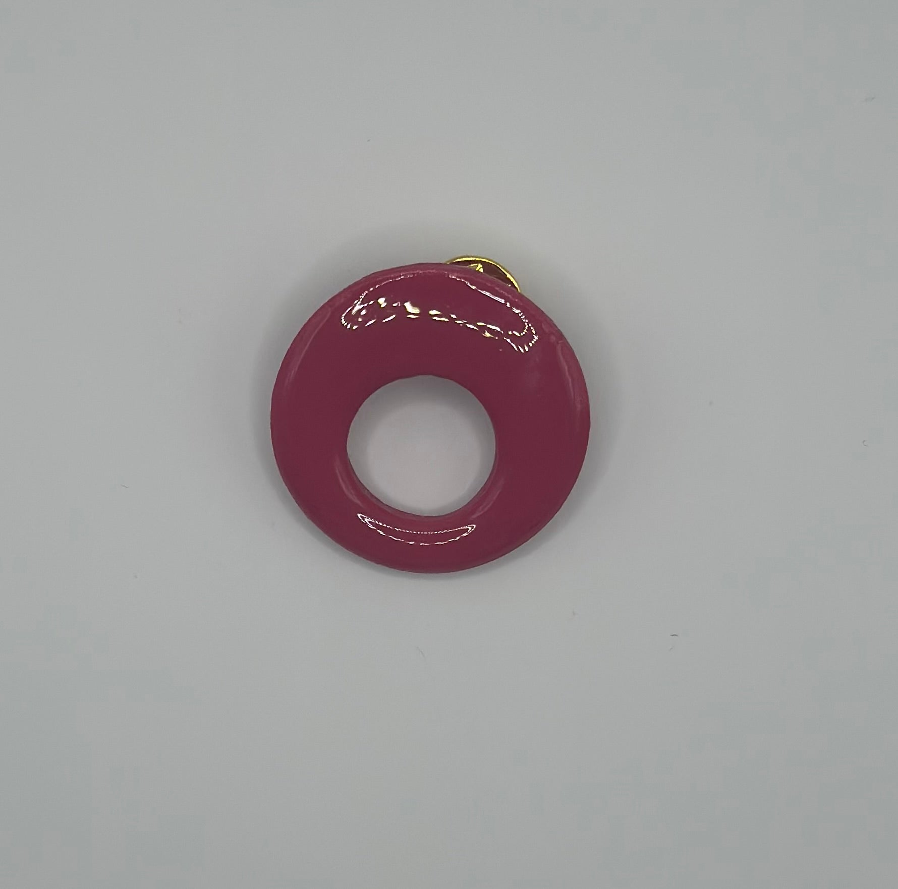 Pin’s de lunette rond fuchsia