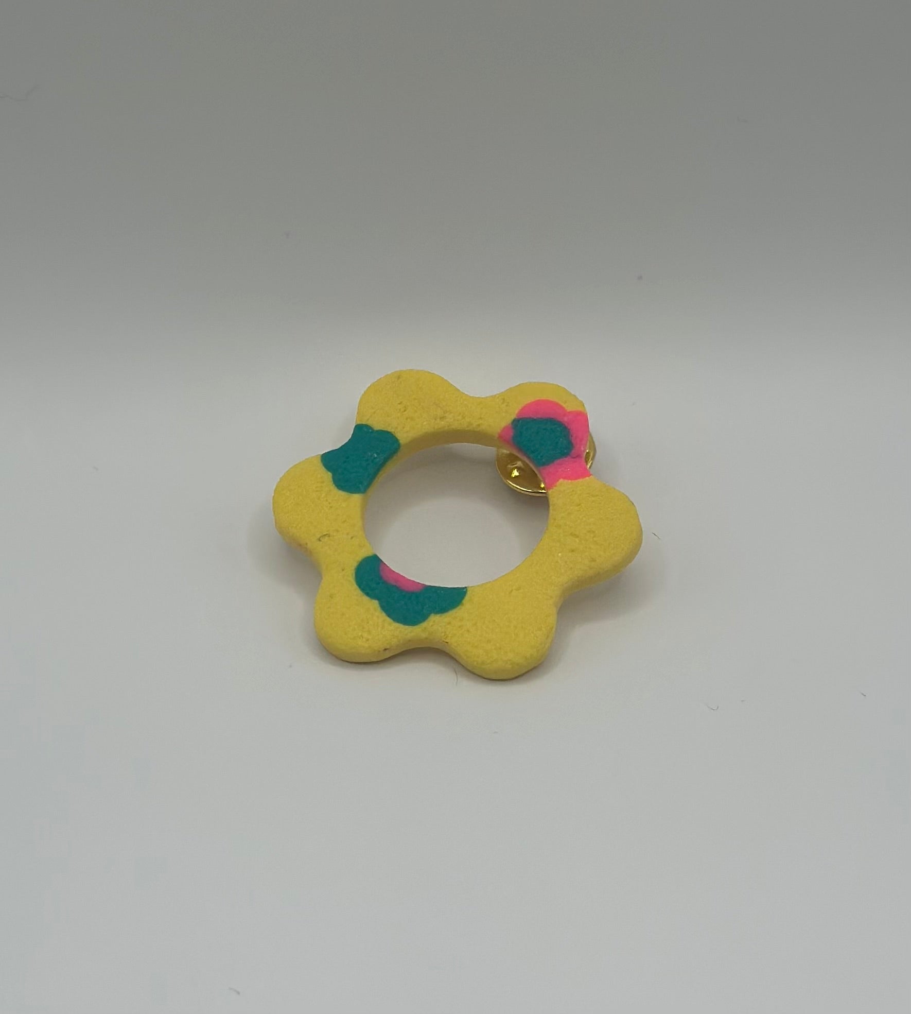 Pin’s de lunette fleur jaune fleuri