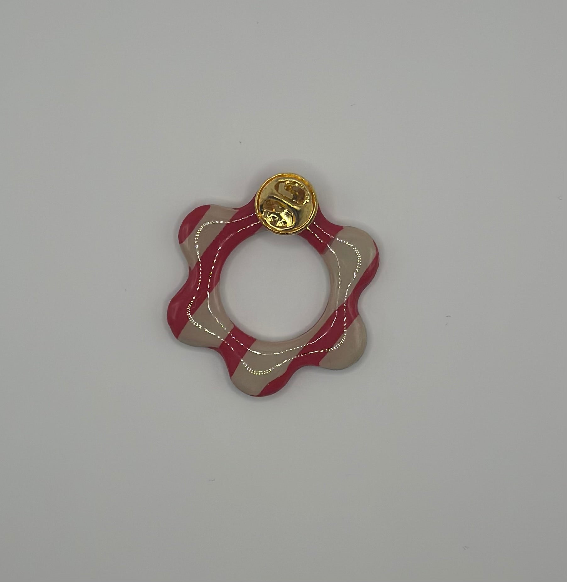 Pin’s de lunette fleur à rayures