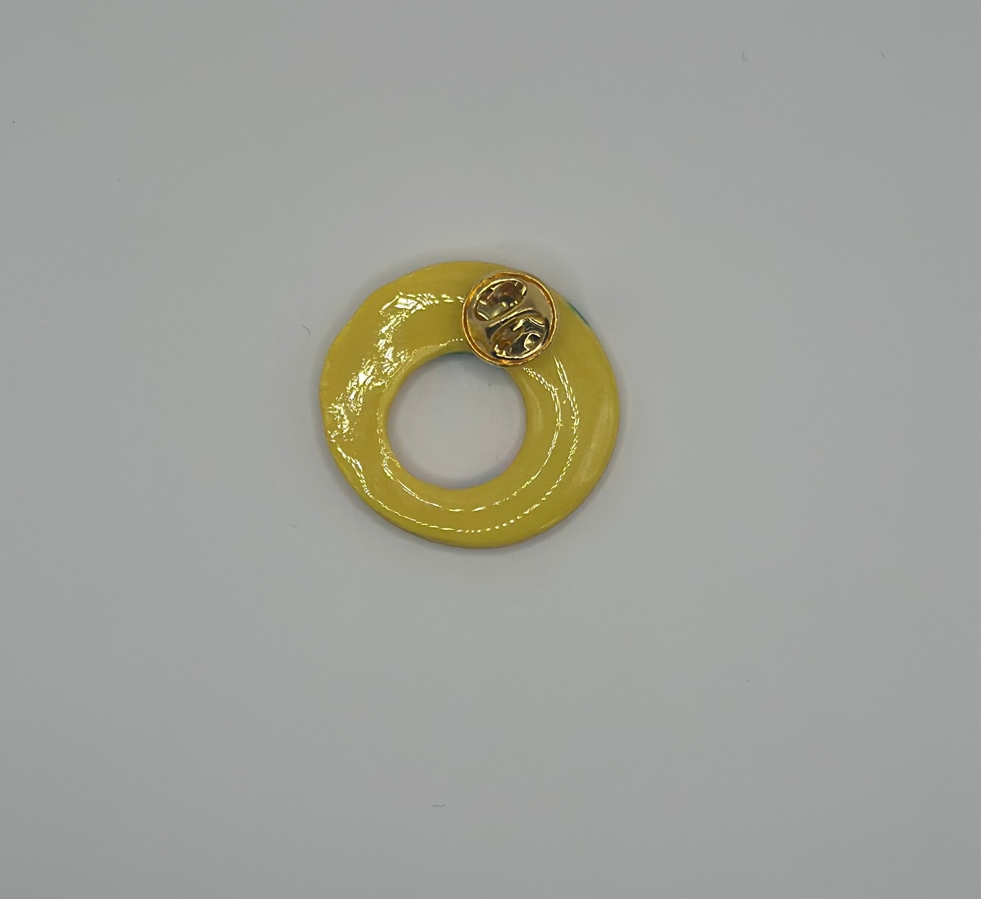 Pin’s de lunette jaune fleuri