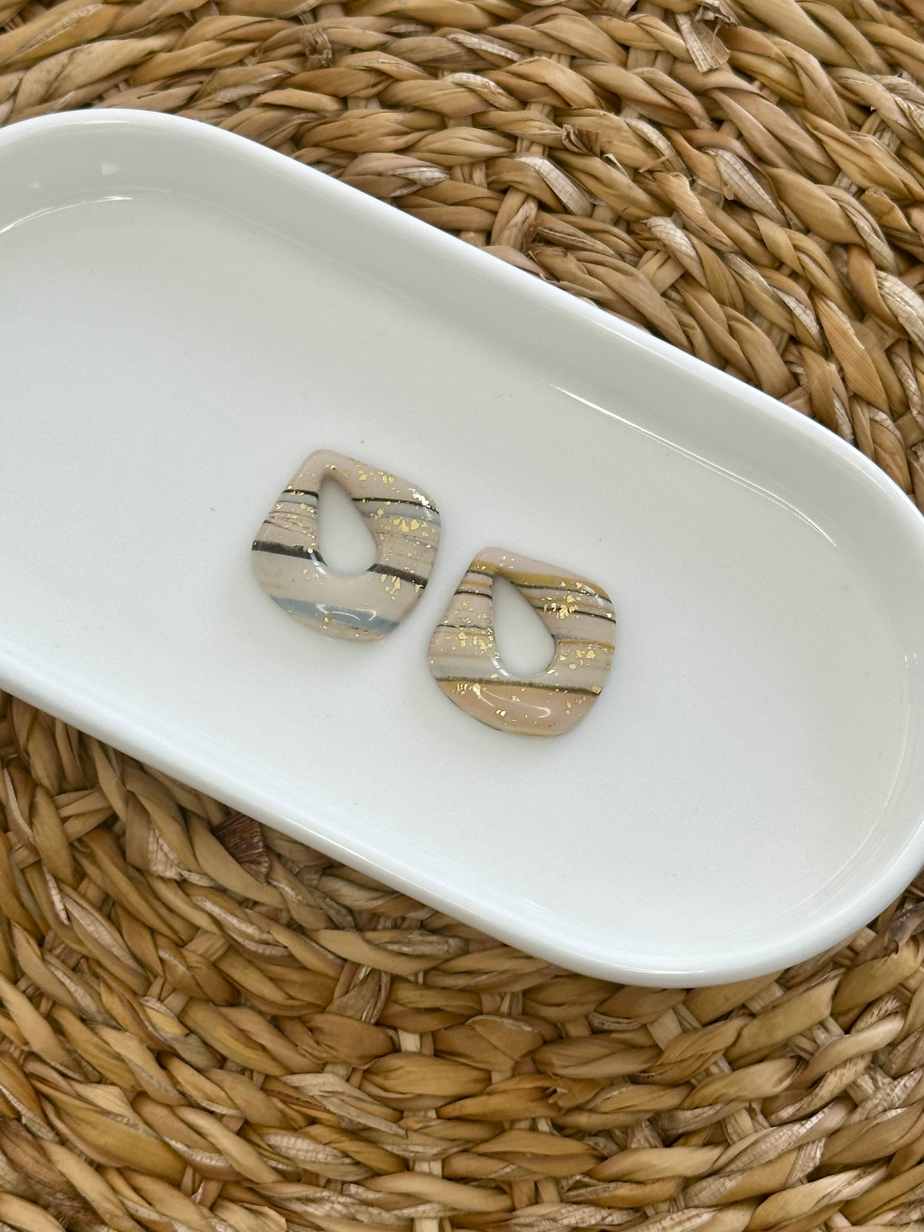 goutte rayée marron or