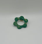 Pin’s de lunette fleur verte et or