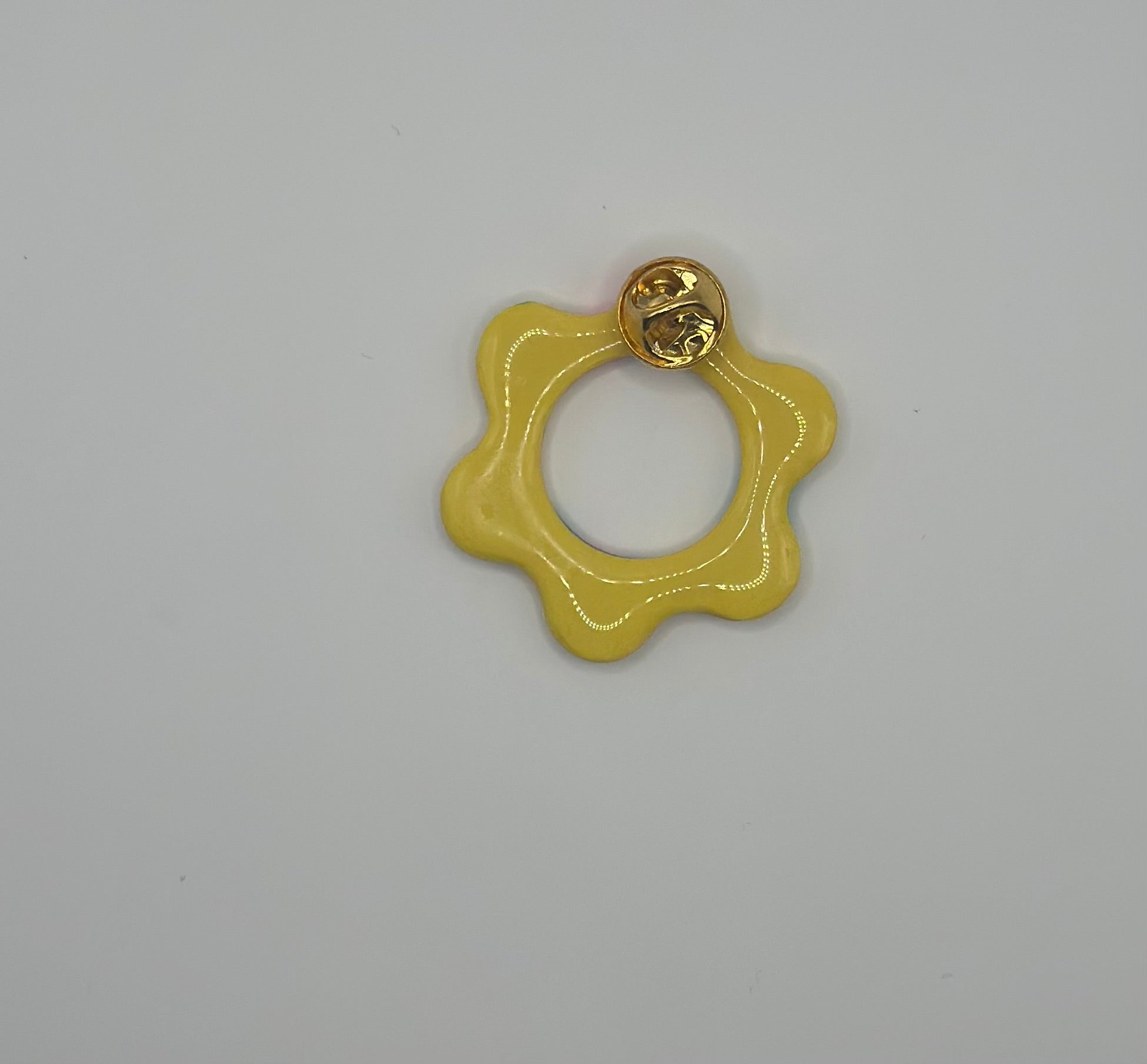 Pin’s de lunette fleur jaune fleuri