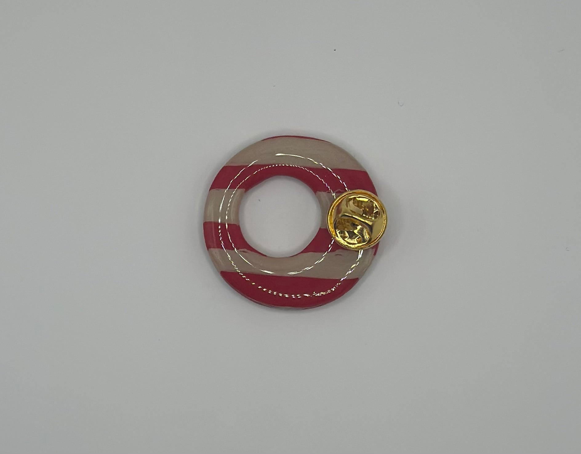 Pin’s de lunette rond à rayures